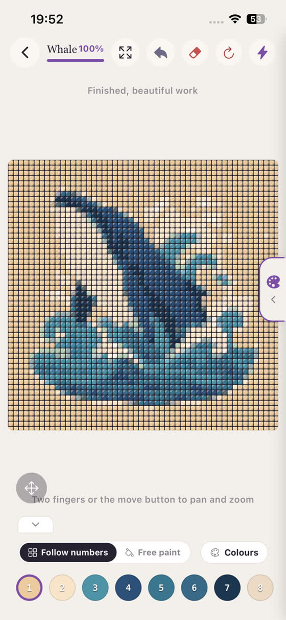 A whale mosaic being filled in on the phone, with numbered colours along the bottom